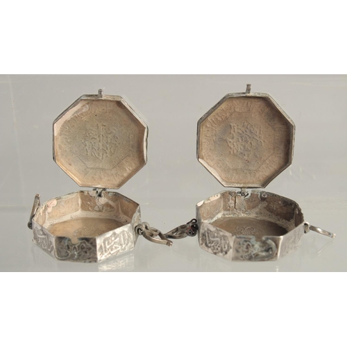 1566 - TWO SMALL ISLAMIC SILVER OCTAGONAL BOXES. 1.75ins.