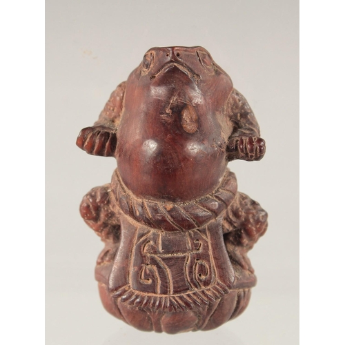 1578 - A WOODEN NETSUKE OF A FROG 2ins.