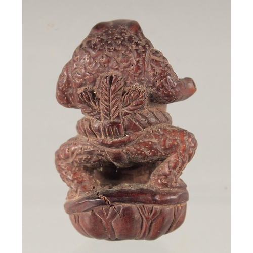 1578 - A WOODEN NETSUKE OF A FROG 2ins.