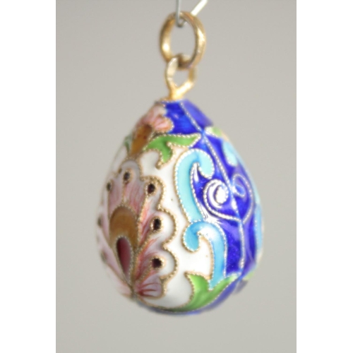 1588 - A RUSSIAN SILVER AND ENAMEL EGG PENDANT. 1ins long.