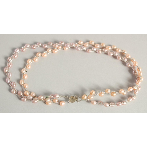 1596 - A SILVER AND PEARL DOUBLE ROW NECKLACE.