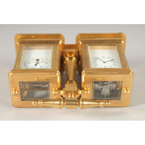 1637 - A GILT BRONZE DOUBLE CARRIAGE CLOCK. 4ins high with carrying handle.