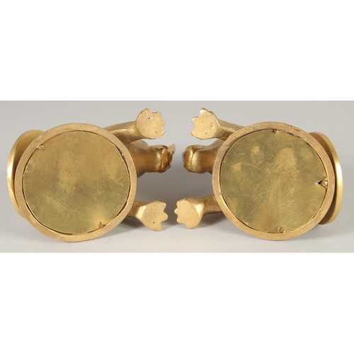 1639 - A PAIR OF GILT BRONZE RHINO DESK WEIGHTS. 5ins long.