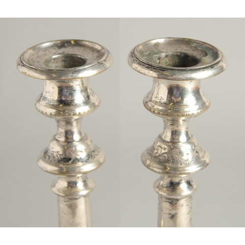 1662 - A PAIR OF FRENCH PLAIN CANDLESTICKS. 9.5ins high.