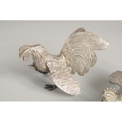 1665 - A PAIR OF FIGHTING COCK TABLE ORNAMENTS. 5ins high.