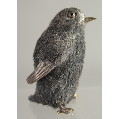 1676 - A MARIO BUCCULLATI SILVER THREAD PENGUIN. Signed. 3ins high in a blue box.