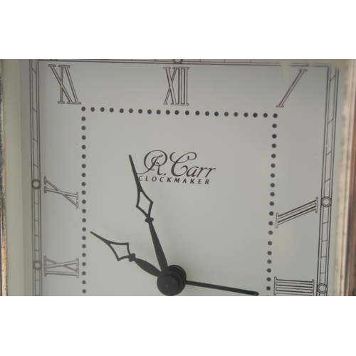 1678 - A SILVER UPRIGHT EASEL CLOCK by R. CARR, with bead edge. 6.5ins high x 4.5ins wide.