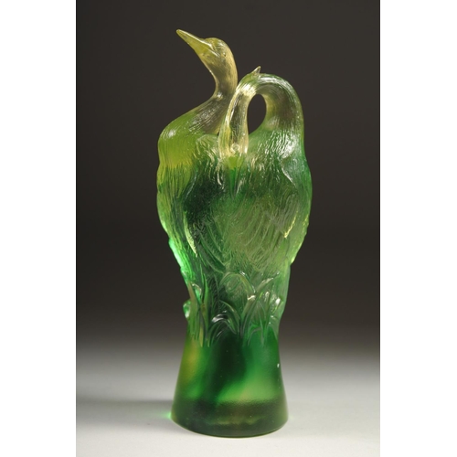 1713 - A GOOD PAIR OF TITTOT GREEN GLASS ENTWINED BIRDS. Signed 6.5ins high.