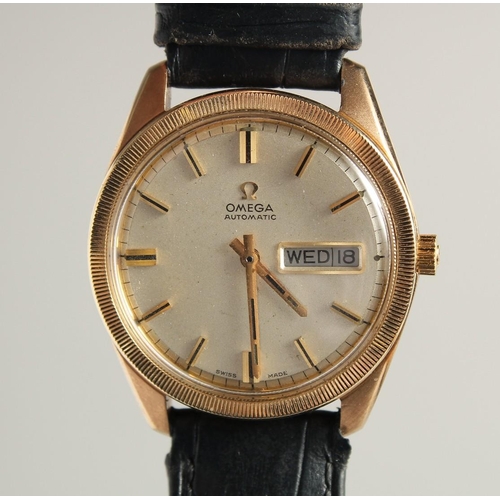 1722 - A GENTLEMAN'S 9CT GOLD OMEGA SEAMASTER AUTOMATIC OVERSIZE DAY DATE WRISTWATCH with leather strap, in... 