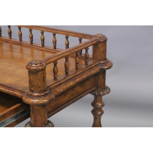 1009 - A 19TH CENTURY STYLE WALNUT WRITING TABLE with spindle back, sliding drawer with fall front, on turn... 