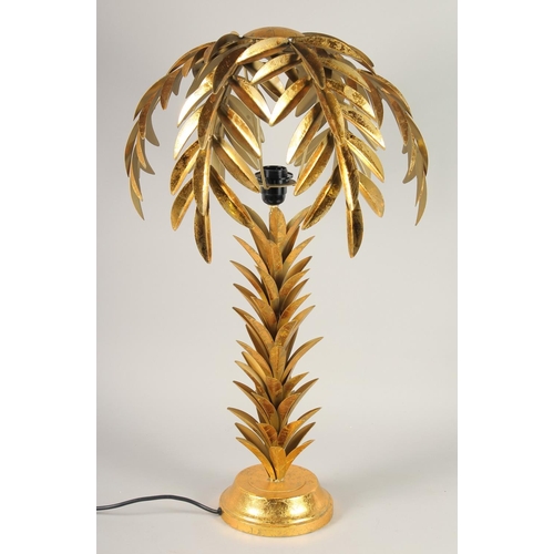 1020 - A GILT METAL PALM TREE TABLE LAMP. 2ft 4ins high.