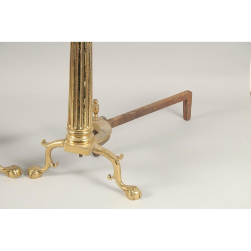 1030 - A PAIR OF BRASS COLUMN ANDIRONS. 2ft high.