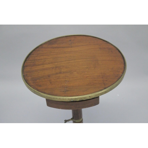 1044 - A 19TH CENTURY FRENCH CIRCULAR TOP CAMPAIGN TABLE on tripod base.