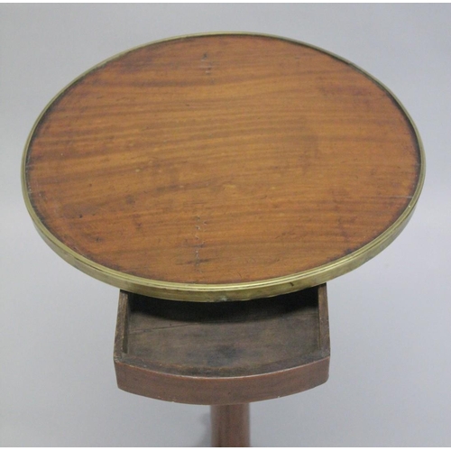 1044 - A 19TH CENTURY FRENCH CIRCULAR TOP CAMPAIGN TABLE on tripod base.