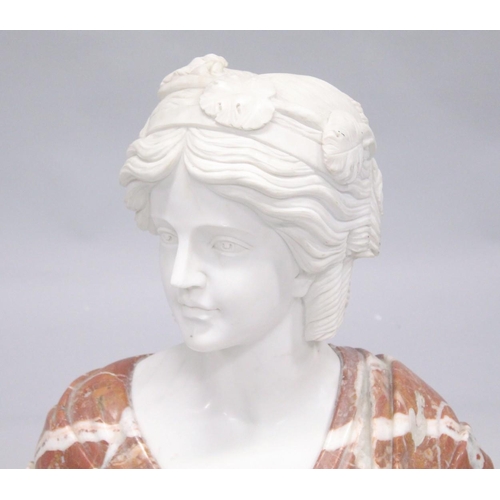 1050 - A GOOD ITALIAN CARVED TWO COLOUR MARBLE BUST OF A CLASSICAL LADY. 1ft 10ins high.