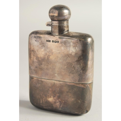 1884 - A HEAVY PLAIN SILVER WHISKY FLASK Sheffield 1918, weight 8ozs.