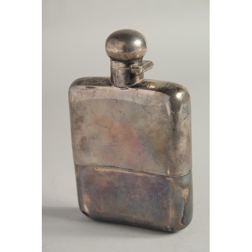 1884 - A HEAVY PLAIN SILVER WHISKY FLASK Sheffield 1918, weight 8ozs.