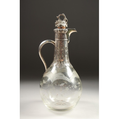 1891 - A VERY GOOD VICTORIAN CLARET JUG BY GEORGE FOX with etched glass and engraved and silver mounts, wit... 