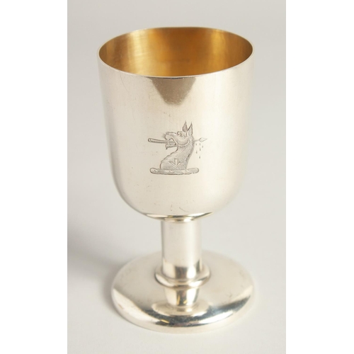 1892 - AN EXCELLENT PAIR OF SILVER GOBLETS BY R. J. J. with gilt interior.  Griffin crest. 4.75ins high, we... 