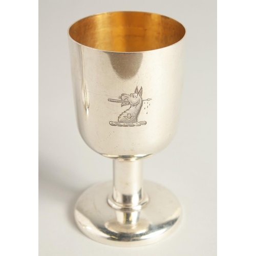 1892 - AN EXCELLENT PAIR OF SILVER GOBLETS BY R. J. J. with gilt interior.  Griffin crest. 4.75ins high, we... 