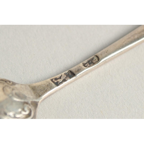 1895 - A SET OF TEN GEORGE II PICTURE BACK SILVER TEASPOONS with cast classical head finials.