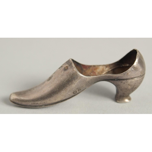 1896 - A LARGE SILVER SHOE, 4.75ins long, Birmingham 1903, and another, 2.5ins long.  Birmingham 1938 (2).