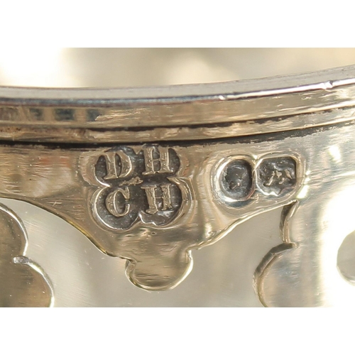 1897 - A SUPERB VICTORIAN SILVER OVAL INKSTAND with pierced gallery, two glass top bottles and silver toppe... 