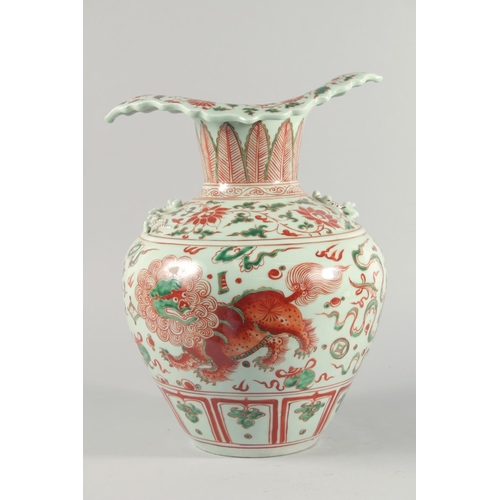 1 - A VERY LARGE CHINESE IRON RED AND GREEN PORCELAIN VASE, with unusual leaf-form rim, moulded chilong ... 