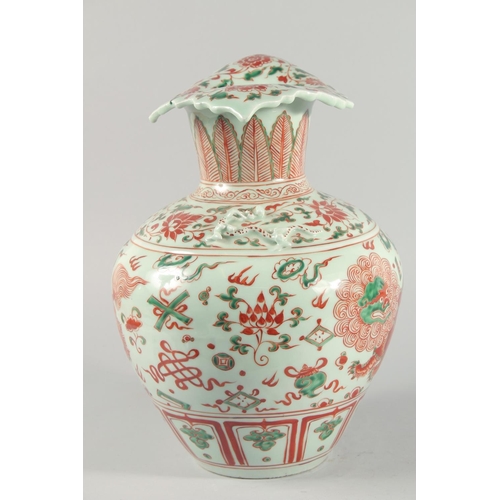 1 - A VERY LARGE CHINESE IRON RED AND GREEN PORCELAIN VASE, with unusual leaf-form rim, moulded chilong ... 