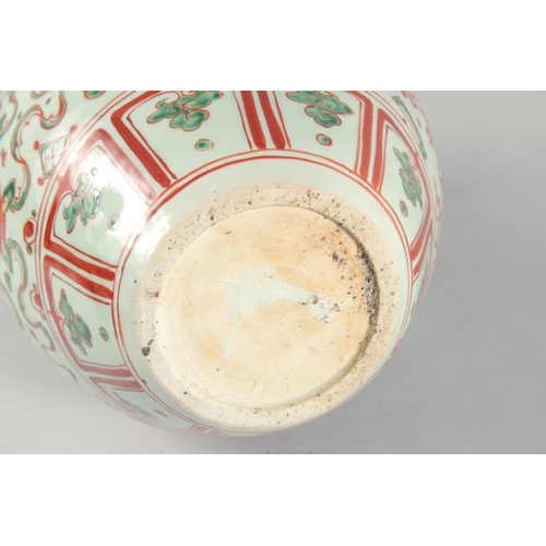 1 - A VERY LARGE CHINESE IRON RED AND GREEN PORCELAIN VASE, with unusual leaf-form rim, moulded chilong ... 