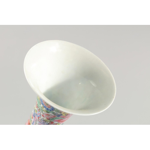 10 - A TALL CHINESE FAMILLE ROSE EGGSHELL PORCELAIN VASE, decorated with flowers and dragons, 50.5cm high... 