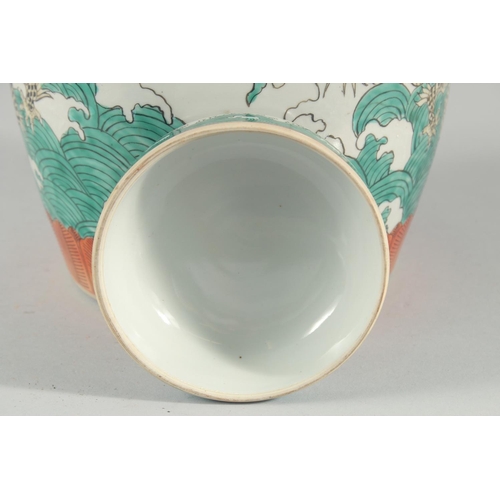 13 - A CHINESE TRICOLOUR PORCELAIN JAR AND COVER, 25cm high.