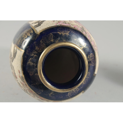 15 - TWO JAPANESE SATSUMA VASES, the larger painted with panels of figures in a landscape, each with char... 