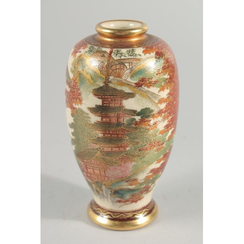 15 - TWO JAPANESE SATSUMA VASES, the larger painted with panels of figures in a landscape, each with char... 