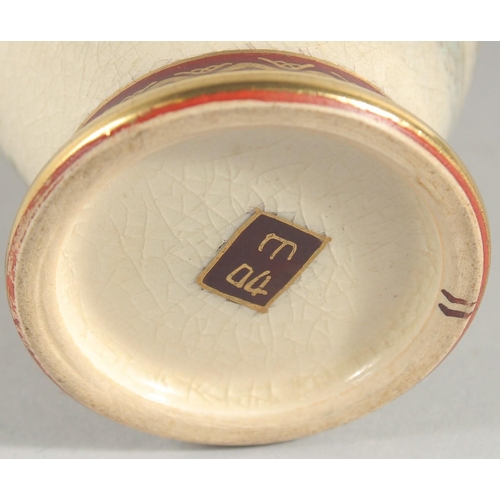 15 - TWO JAPANESE SATSUMA VASES, the larger painted with panels of figures in a landscape, each with char... 