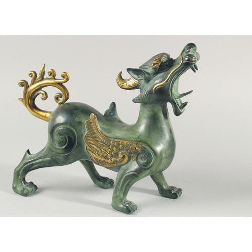 26 - A LARGE METAL FIGURE OF A MYTHOLOGICAL BEAST, 35cm long.