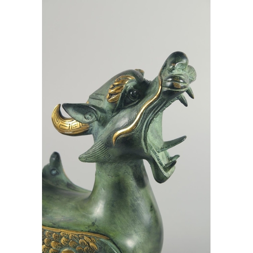 26 - A LARGE METAL FIGURE OF A MYTHOLOGICAL BEAST, 35cm long.