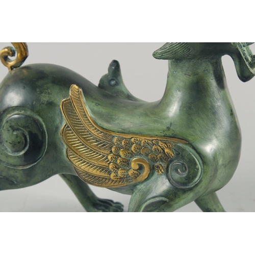 26 - A LARGE METAL FIGURE OF A MYTHOLOGICAL BEAST, 35cm long.