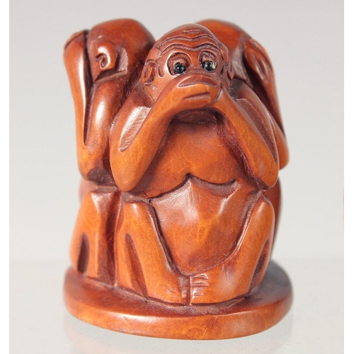 28 - THREE WOODEN CARVINGS, together with two walnut carvings, (5).