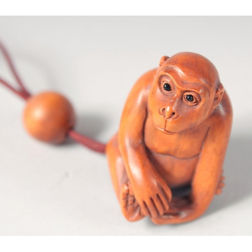 28 - THREE WOODEN CARVINGS, together with two walnut carvings, (5).