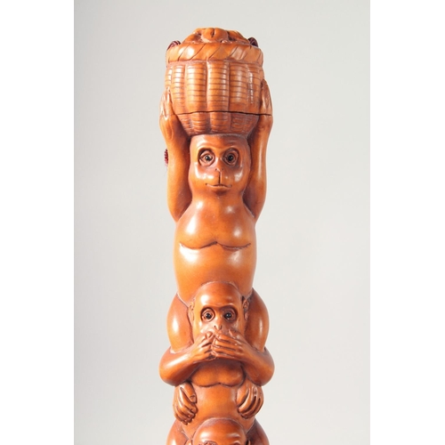 28 - THREE WOODEN CARVINGS, together with two walnut carvings, (5).