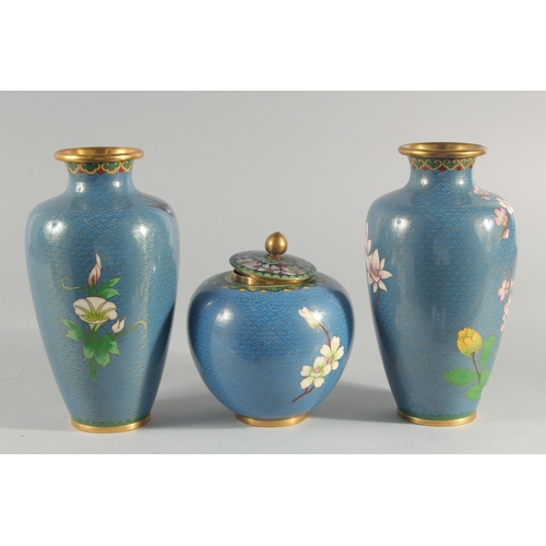 3 - TWO CHINESE BLUE GROUND CLOISONNE VASES, and a similar jar with associated cover, vases 23.5cm high,... 