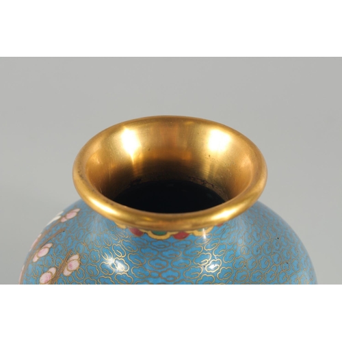 3 - TWO CHINESE BLUE GROUND CLOISONNE VASES, and a similar jar with associated cover, vases 23.5cm high,... 