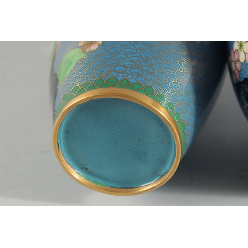 3 - TWO CHINESE BLUE GROUND CLOISONNE VASES, and a similar jar with associated cover, vases 23.5cm high,... 