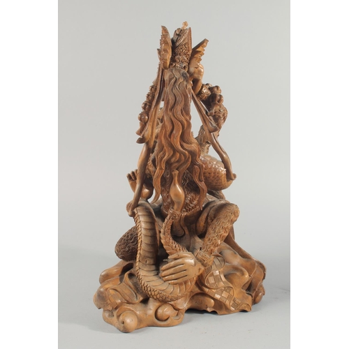 30 - A GOOD QUALITY LARGE THAI CARVED WOOD FIGURAL GROUP, 48cm high.