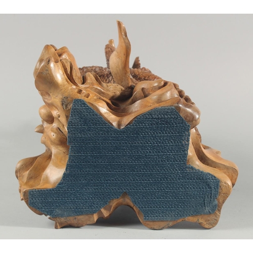 30 - A GOOD QUALITY LARGE THAI CARVED WOOD FIGURAL GROUP, 48cm high.