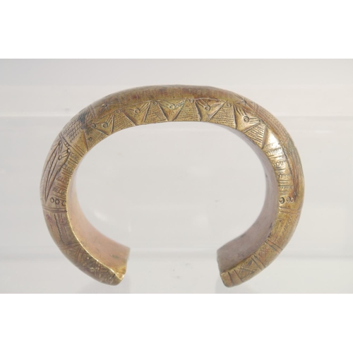 32 - A LOT OF FOUR METAL ITEMS, including two bangles, (4).