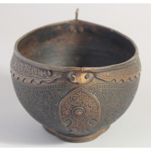 35 - AN ISLAMIC ENGRAVED BRASS KASHKOOL, 20.5cm wide.