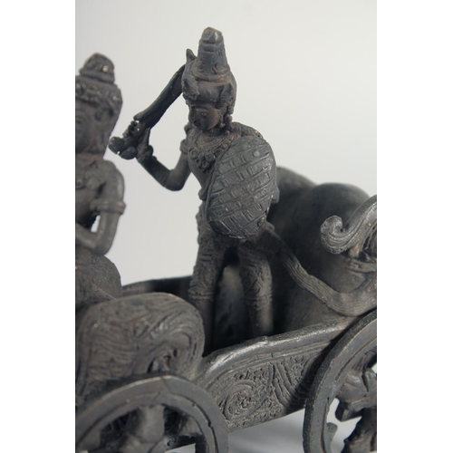 43 - A BURMESE BRONZE MODEL OF A CART, with two figures being pulled by horses, 25.5cm long.
