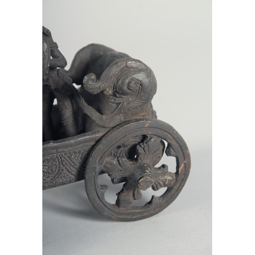 43 - A BURMESE BRONZE MODEL OF A CART, with two figures being pulled by horses, 25.5cm long.